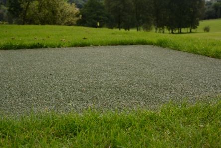 artificial tee surface for golf course