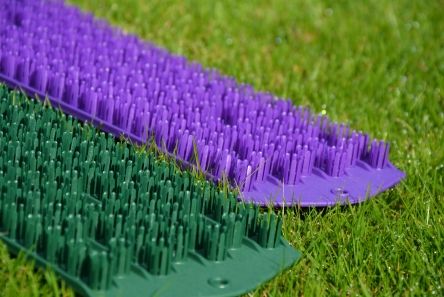 green and purple fairway products multimat