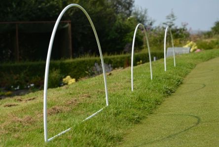 metal control hoop on golf course