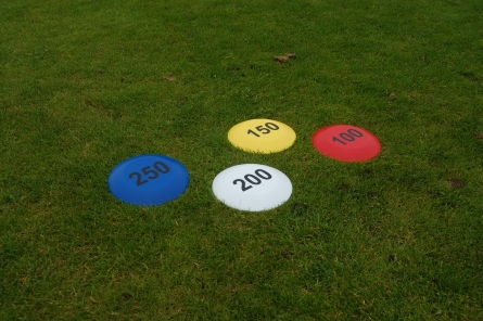 small plastic golf fairway distance marker